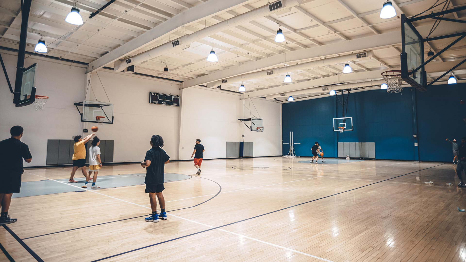 basketball court with people playing in the distance