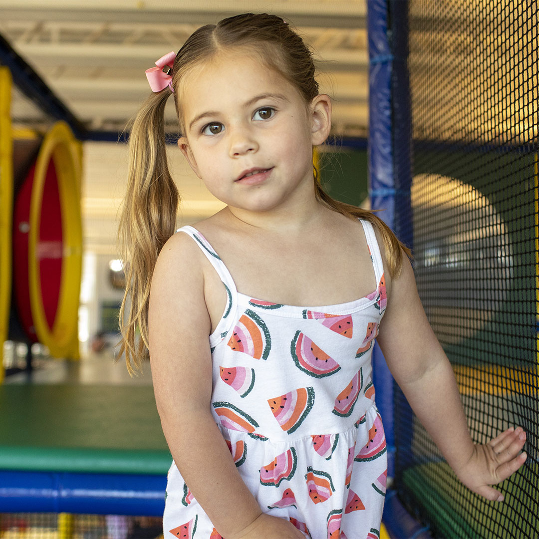 Little girl in play structure