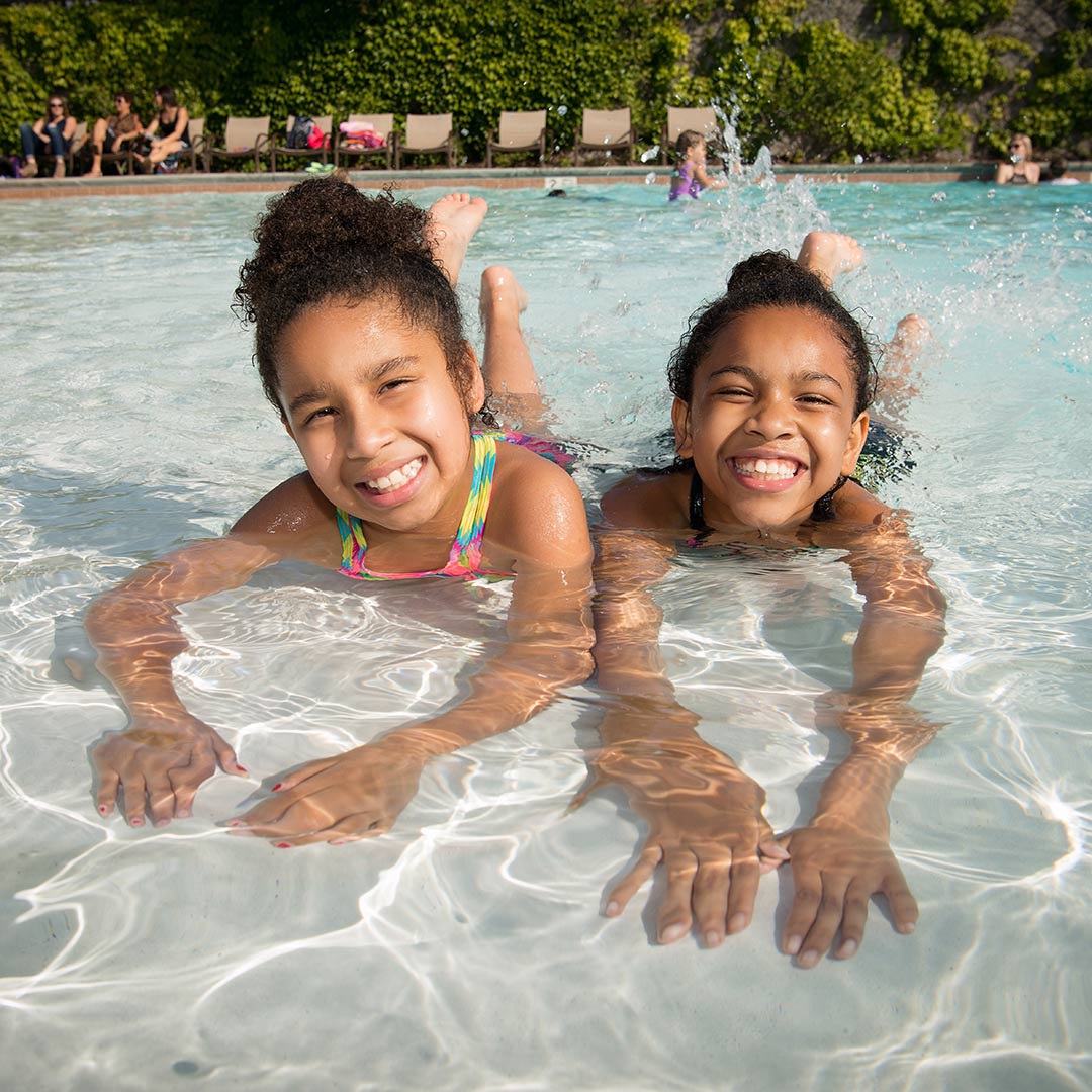 Two kids in swimming pool