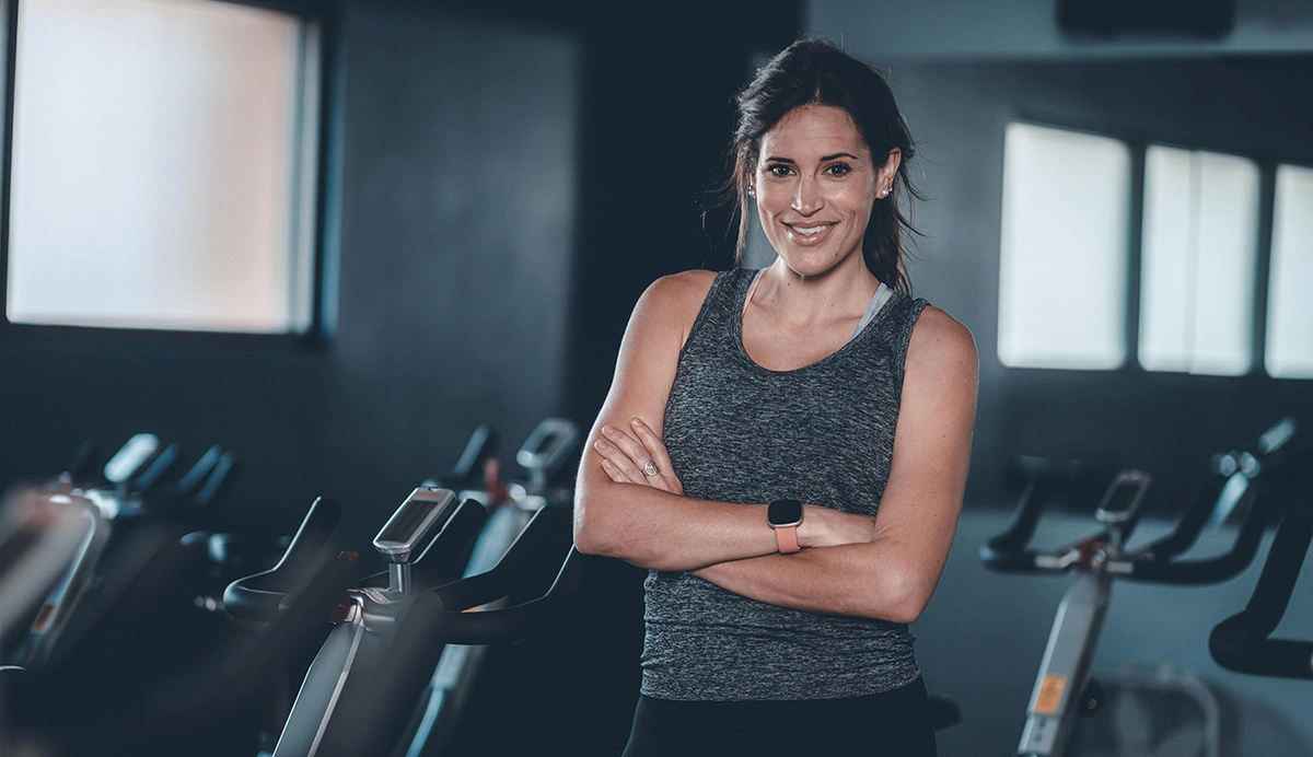 Woman standing in a cycle room