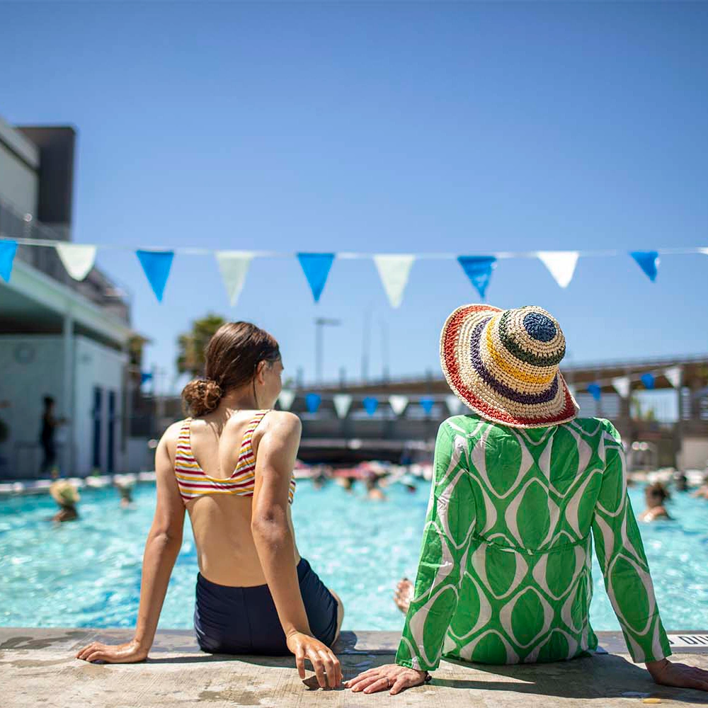 Gyms with Family Swim - photo of friends hanging out at the pool