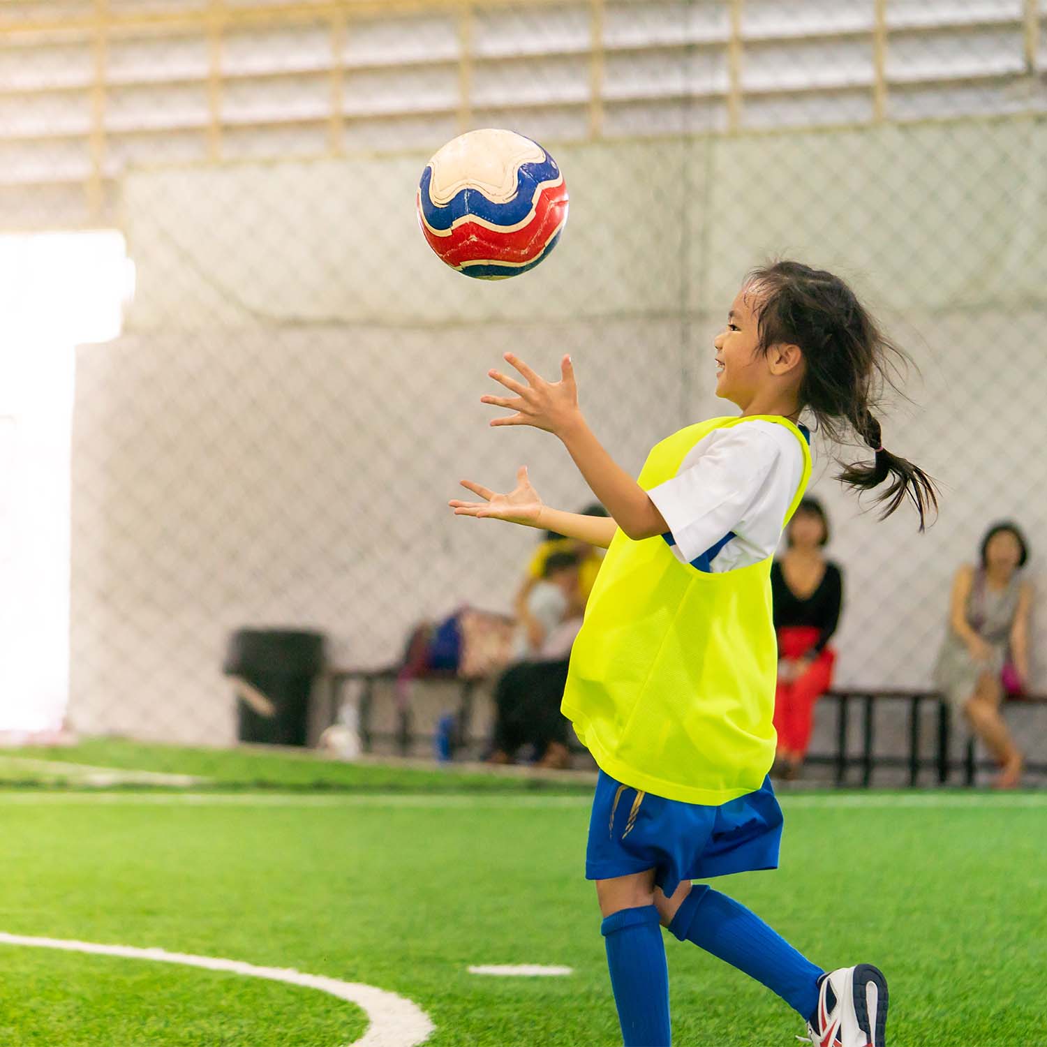 Young Girl Playing Soccer