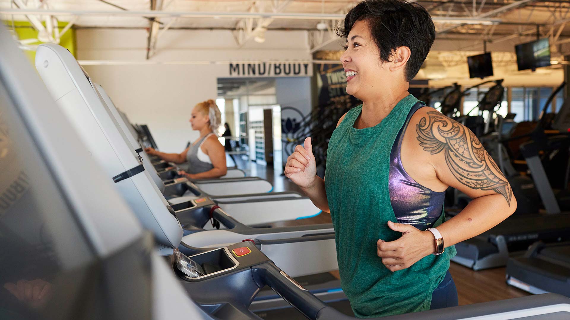 woman jogging on treadmill